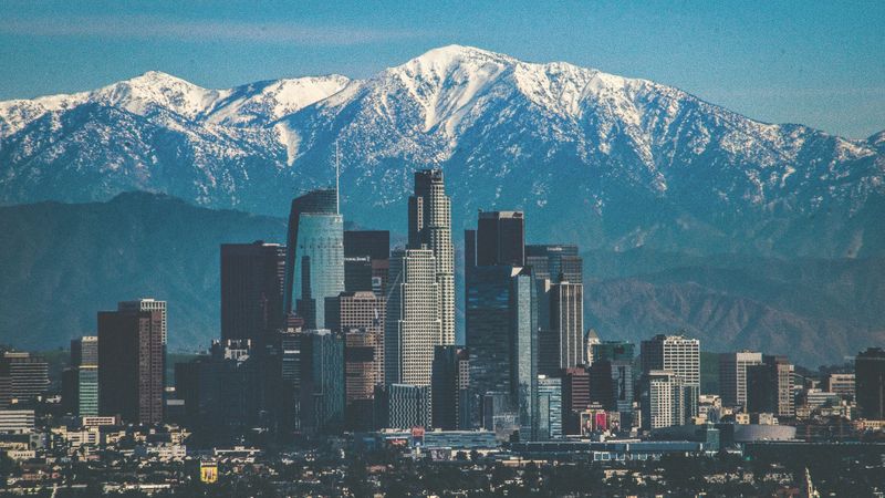 Downtown Los Angeles below the snow-covered San Gabriel Mountains