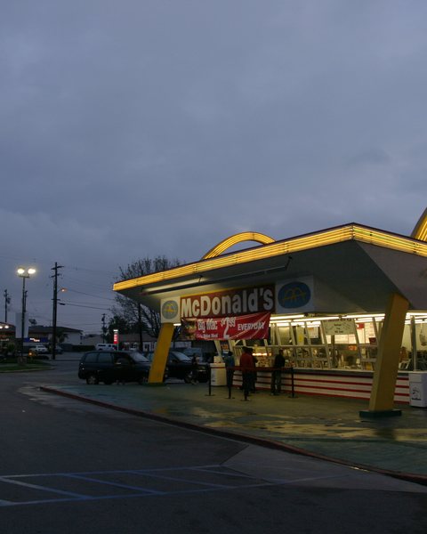 The historic McDonald's stand on Lakewood Boulevard in Downey at dusk