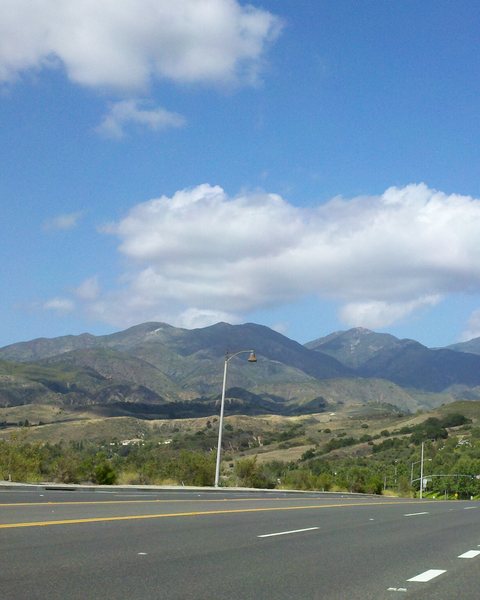 El Toro Road in Lake Forest with the Santa Ana Mountains behind it